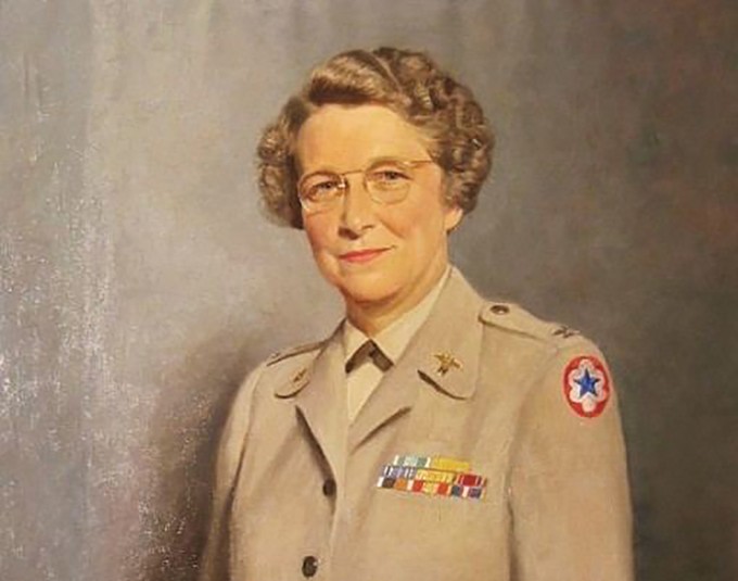 Ruby Bradley in a military uniform is smiling at the camera