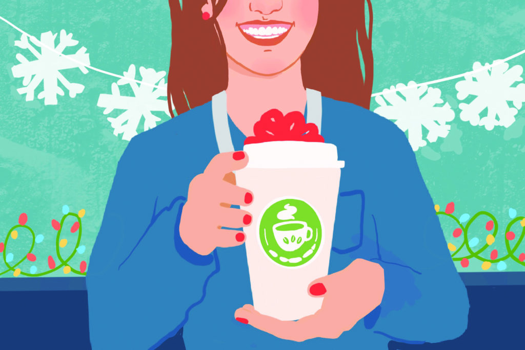 A nurse in scrubs smiling while holding out a coffee with a bow on it